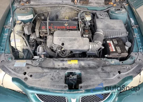 1999 Pontiac Grand Am Se из США, поврежденный, VIN 1G2NE52T0XM701933